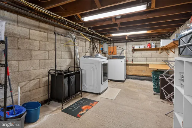 a utility room with dryer and washer