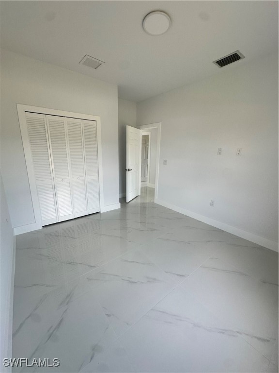 821 Bell Boulevard Lehigh Acres, FL 33974 - Photo 20 of 35 a view of an empty room