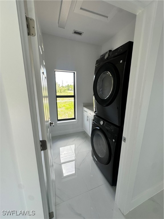 821 Bell Boulevard Lehigh Acres, FL 33974 - Photo 25 of 35 a utility room with dryer and washer