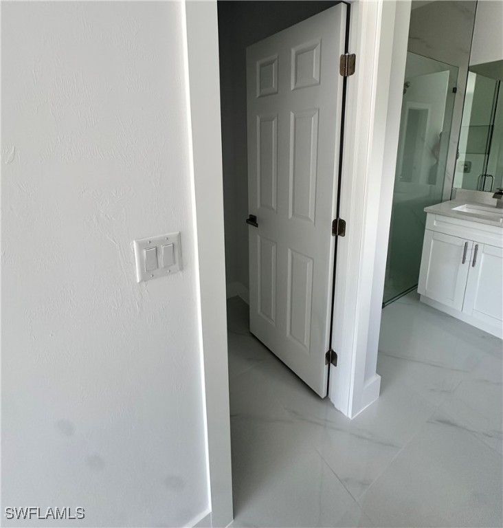 821 Bell Boulevard Lehigh Acres, FL 33974 - Photo 9 of 35 a view of a bathroom with a sink