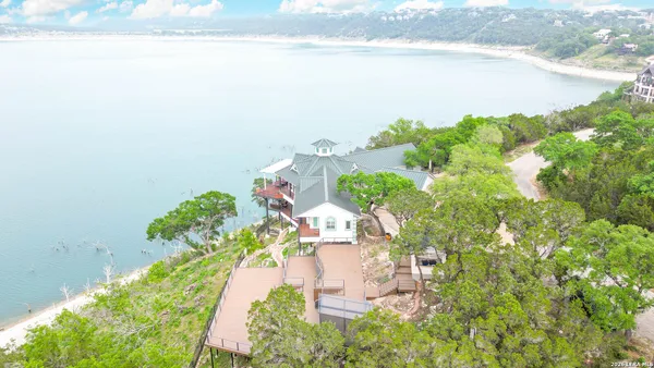a picture of a yard with an ocean view