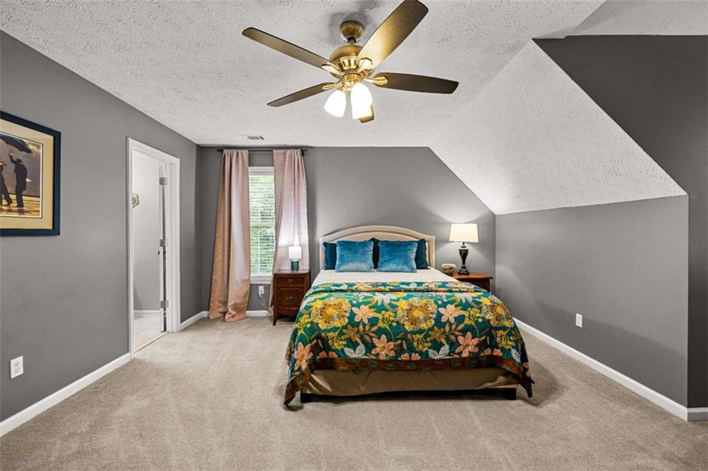 128 Byrom Road Senoia, GA 30276 - Photo 34 of 83 a bedroom with a bed and window