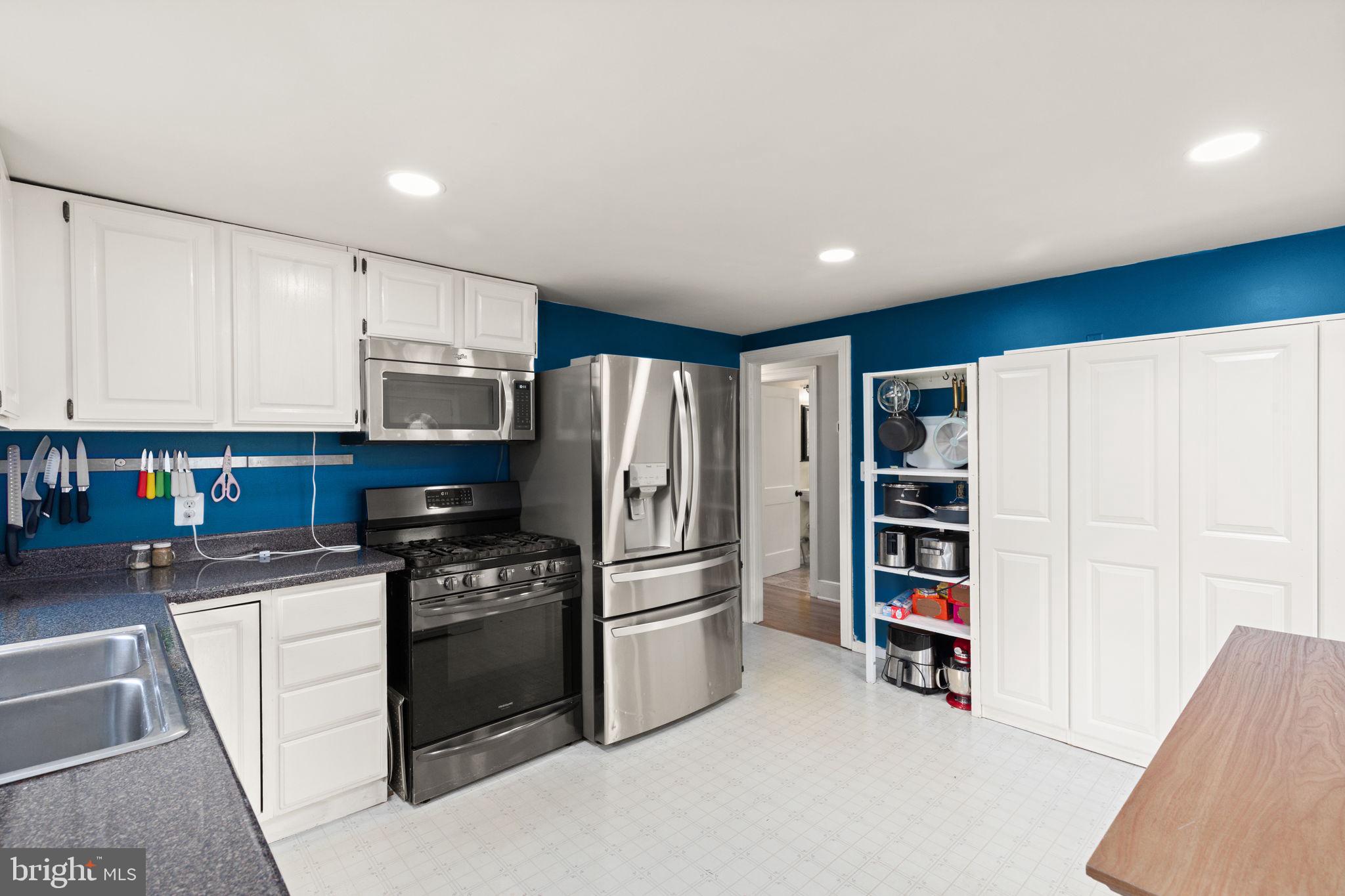105 Mechanics Valley Road North East, MD 21901 - Photo 12 of 34 Modern kitchen with vibrant accents.