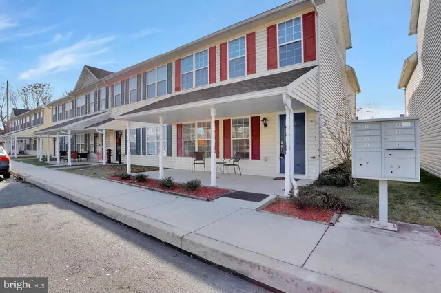 a front view of a building with street view