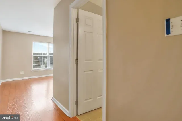a view of balcony with wooden floor