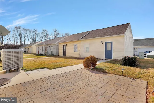 a view of house outdoor space and swimming pool