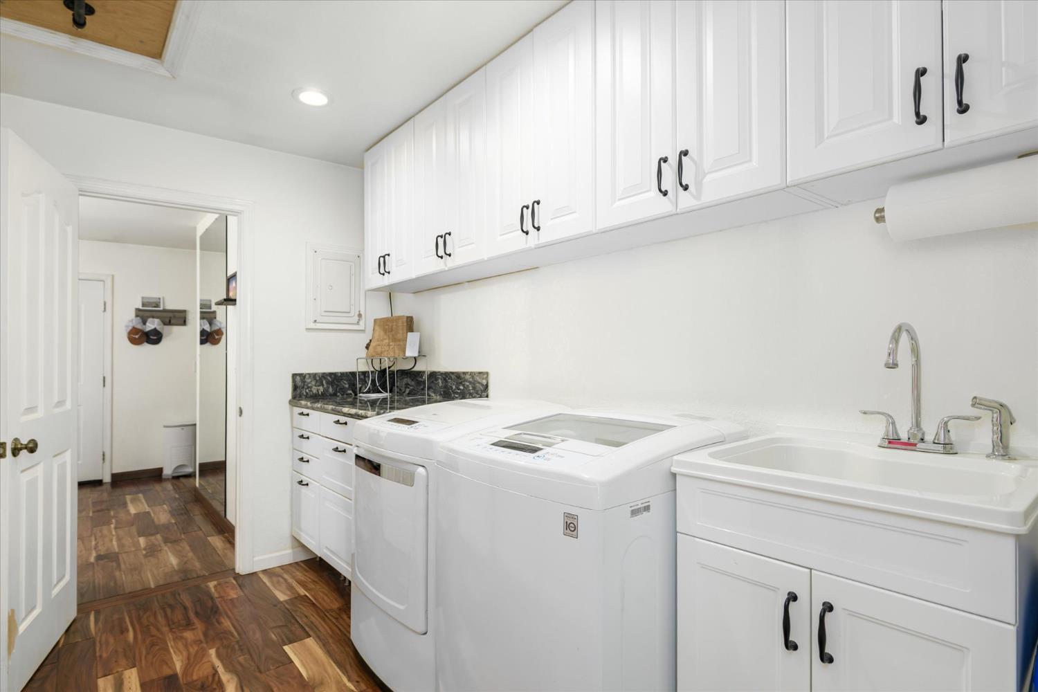 3640 Omo Ranch Road Somerset, CA 95684 - Photo 24 of 57 a view of a kitchen with sink and washing machine