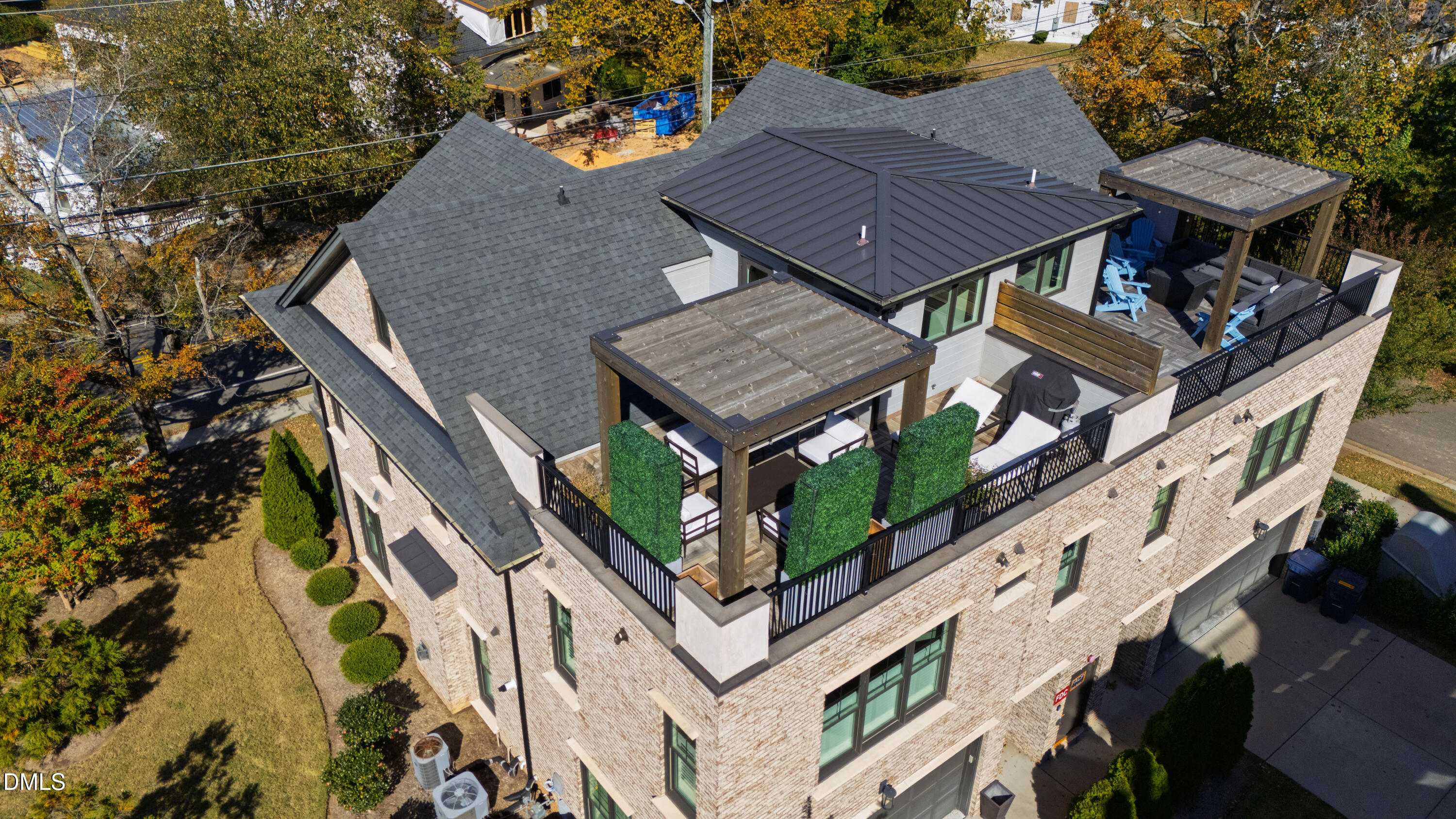 910 Oberlin Road, Unit 101 Raleigh, NC 27605 - Photo 59 of 66 a aerial view of a house with a yard and potted plants