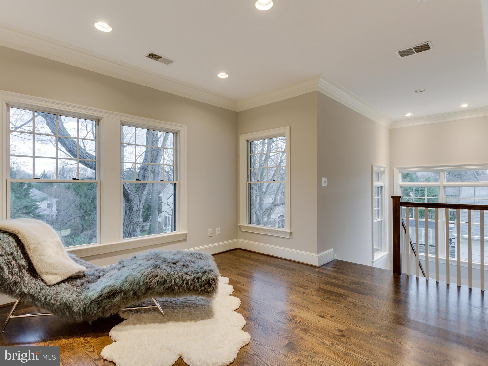 6906 Chelsea Road McLean, VA 22101 - Photo 12 of 25 a view of a livingroom with furniture wooden floor and a window