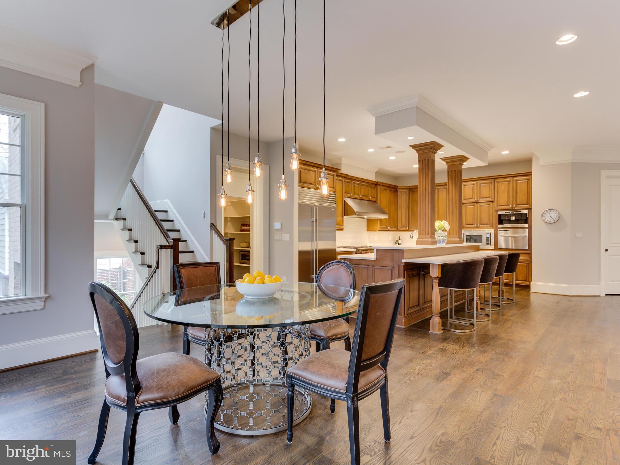 6906 Chelsea Road McLean, VA 22101 - Photo 8 of 25 a dining room with furniture and wooden floor