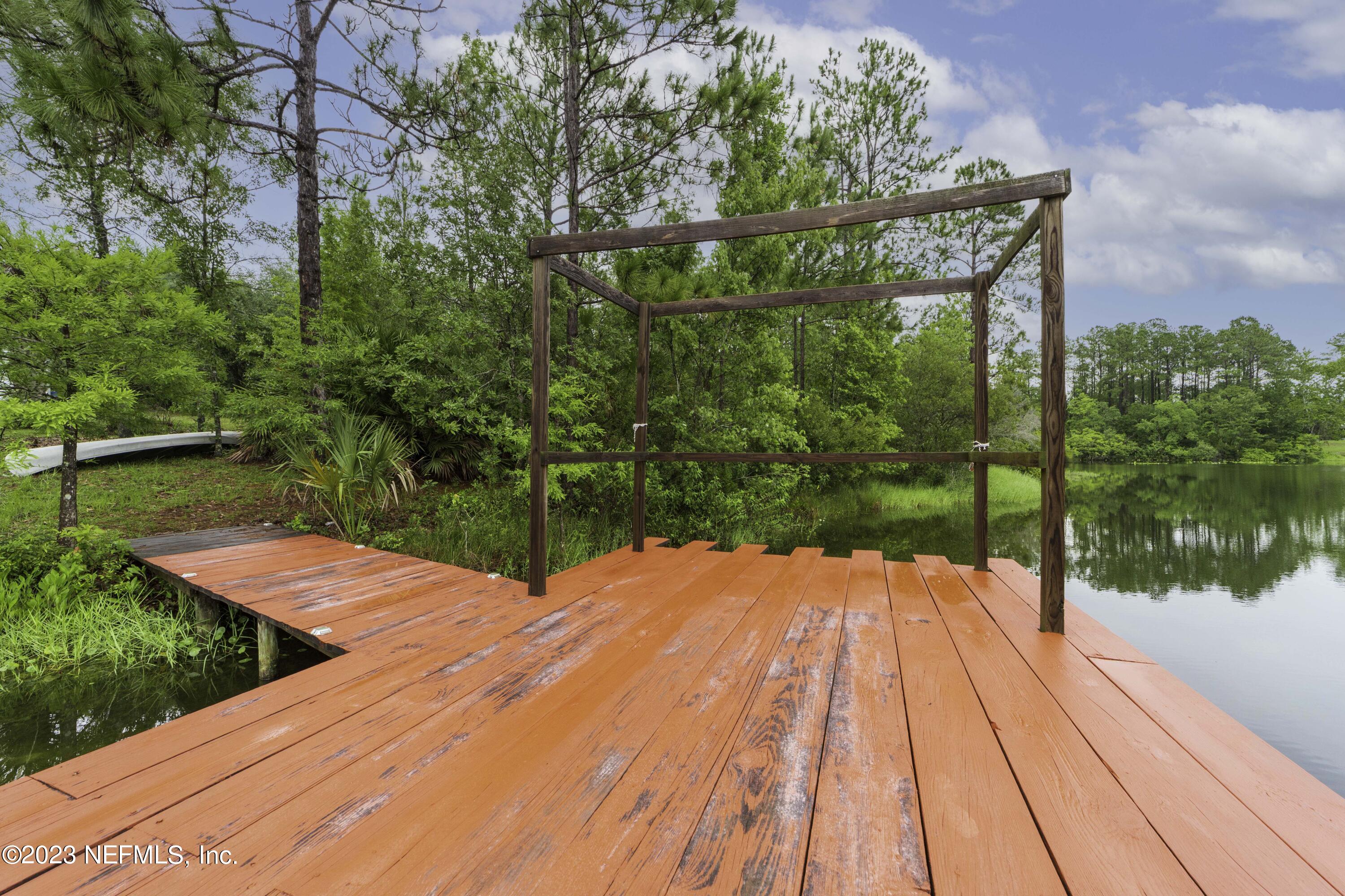 103 Long Branch Court Interlachen, FL 32148 - Photo 11 of 54 a view of an outdoor space with a lake view