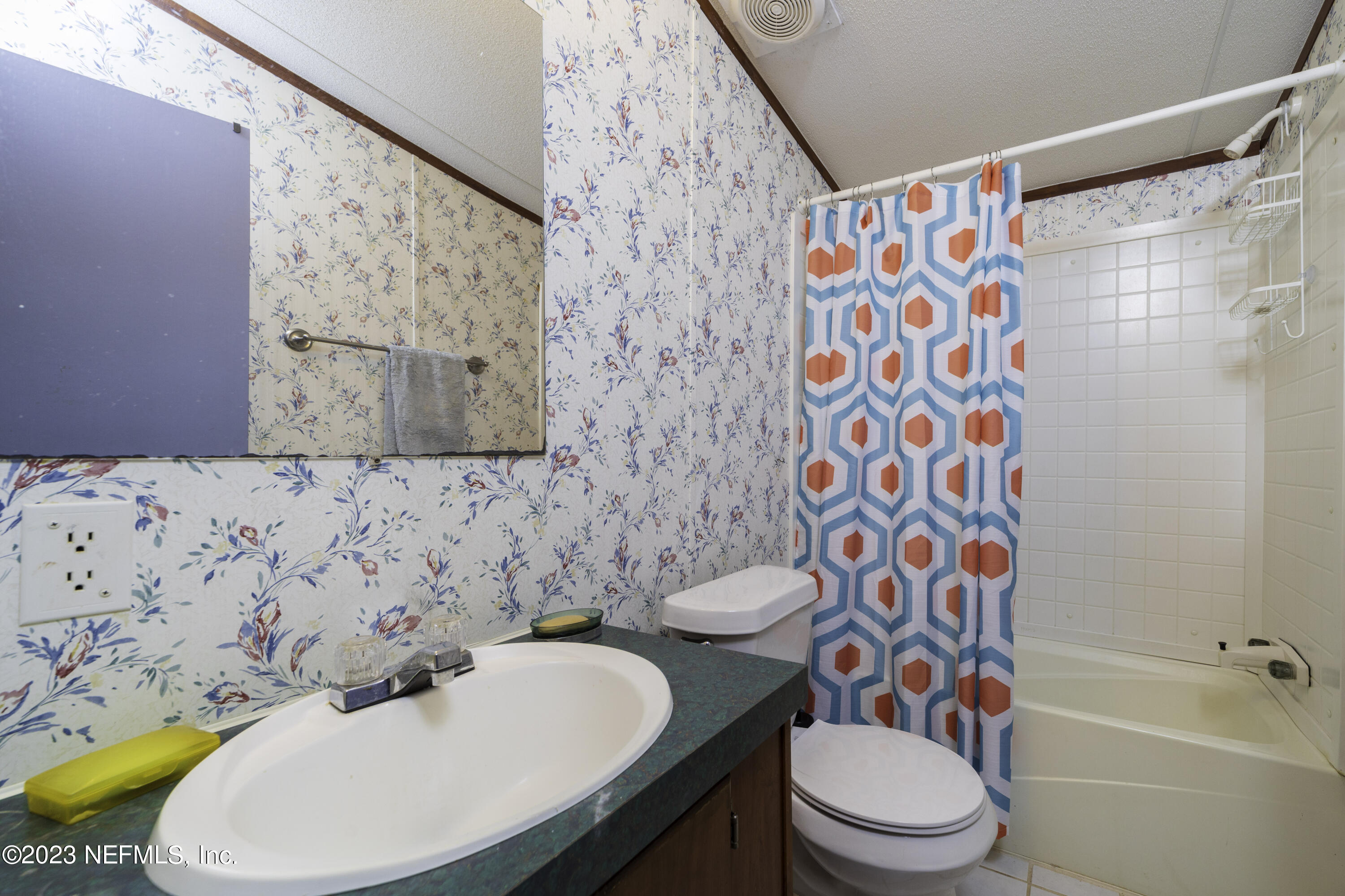 103 Long Branch Court Interlachen, FL 32148 - Photo 38 of 54 a bathroom with a sink toilet and shower