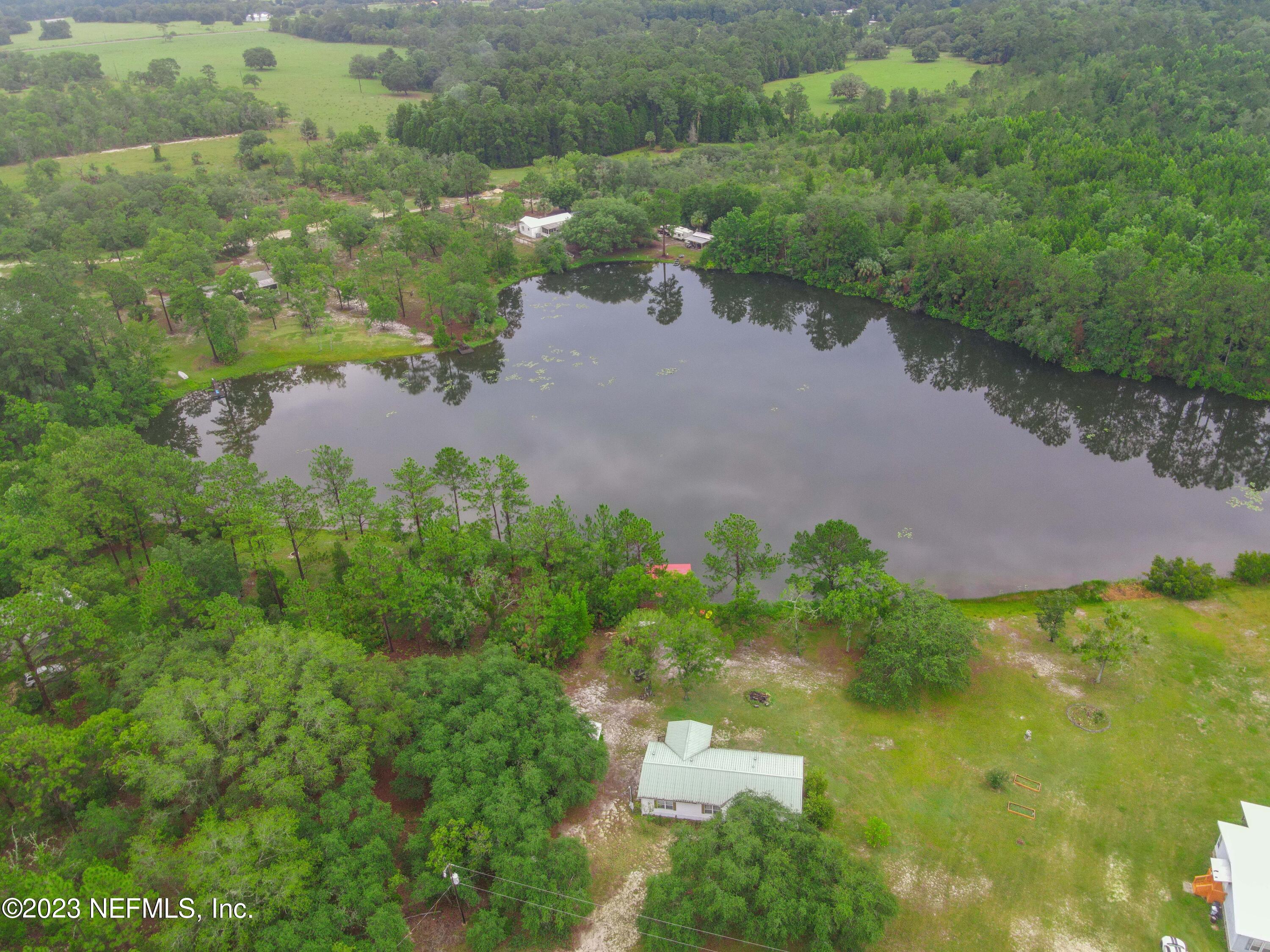 103 Long Branch Court Interlachen, FL 32148 - Photo 51 of 54 an aerial view of a houses with yard