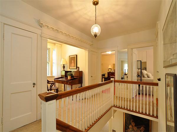 14 Amory Street Brookline, MA 02446 - Photo 12 of 25 a view of a hallway with a chandelier