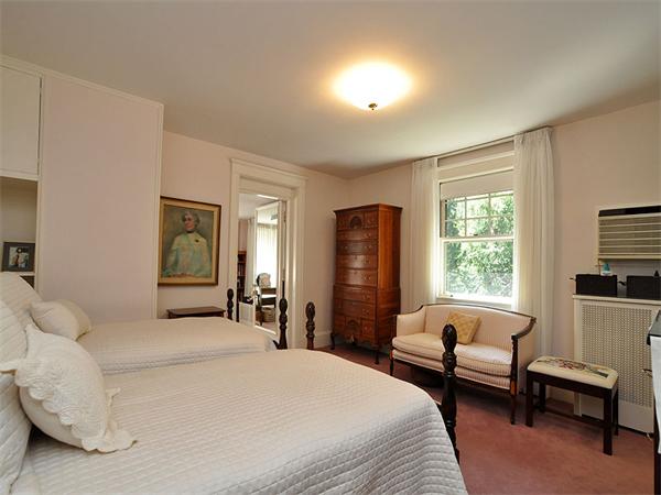 14 Amory Street Brookline, MA 02446 - Photo 17 of 25 a bedroom with a bed and a couch