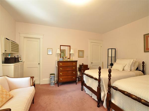 14 Amory Street Brookline, MA 02446 - Photo 18 of 25 a bedroom with furniture and a couch