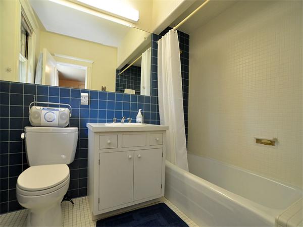 14 Amory Street Brookline, MA 02446 - Photo 19 of 25 a bathroom with a sink a toilet and shower