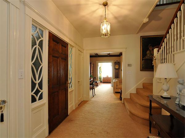 14 Amory Street Brookline, MA 02446 - Photo 2 of 25 a living room with furniture and a chandelier