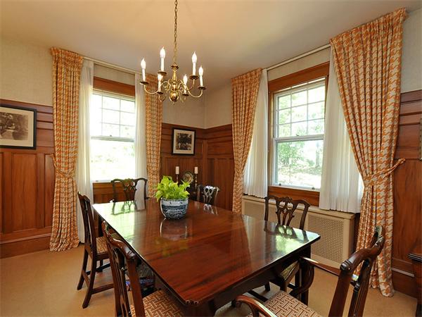 14 Amory Street Brookline, MA 02446 - Photo 7 of 25 a view of a dining room with furniture window and outside view