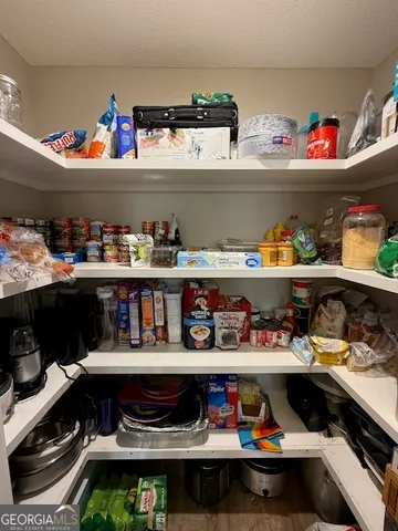 a room with lots of different kinds of food