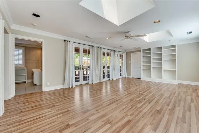 wooden floor and windows in a room