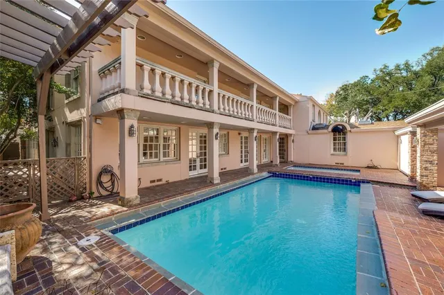 a front view of a house with swimming pool