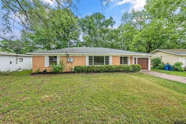 front view of a house and a yard