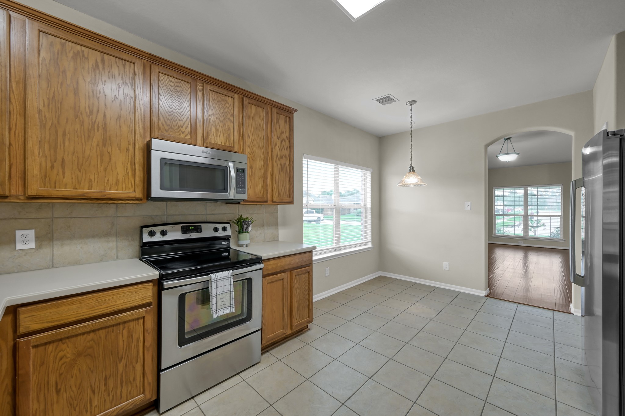 631 Timberstand Lane Spring, TX 77373 - Photo 15 of 38 A spacious breakfast area just off the kitchen provides the perfect spot for casual dining with great natural light.