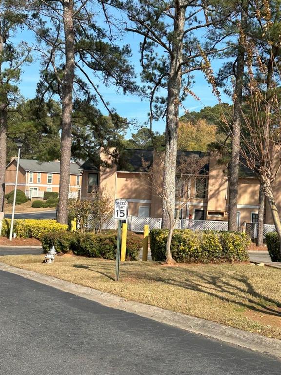 2340 Beaver Ruin Road Norcross, GA 30071 - Photo 2 of 12 a view of a yard with a fountain