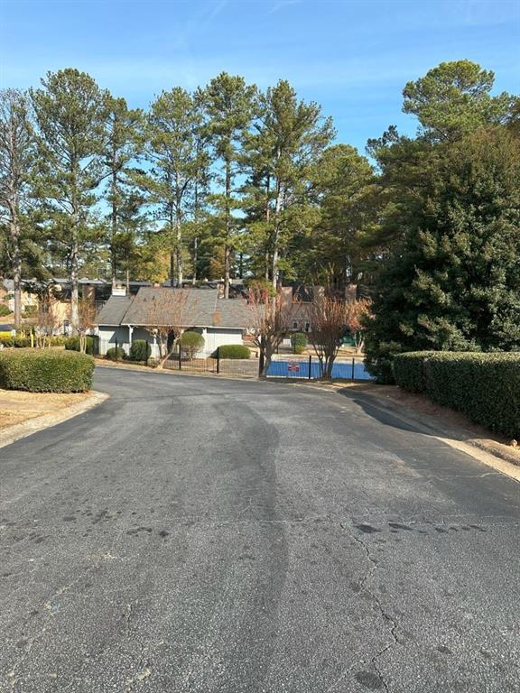 2340 Beaver Ruin Road Norcross, GA 30071 - Photo 4 of 12 a view of street with houses