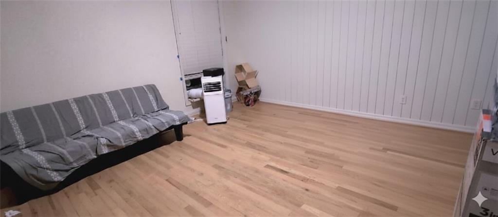 2340 Beaver Ruin Road Norcross, GA 30071 - Photo 6 of 12 a living room with furniture and a wooden floor