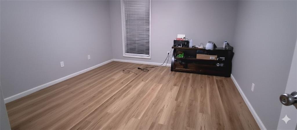 2340 Beaver Ruin Road Norcross, GA 30071 - Photo 7 of 12 a bed room with a bed