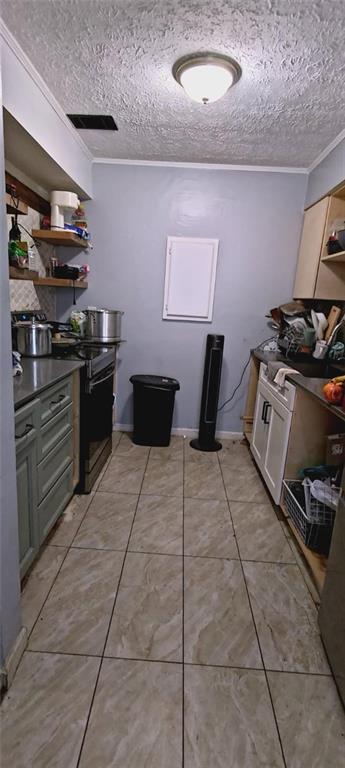 2340 Beaver Ruin Road Norcross, GA 30071 - Photo 8 of 12 a kitchen with stainless steel appliances a stove a sink and a refrigerator