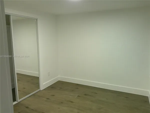 an empty room and wooden floor