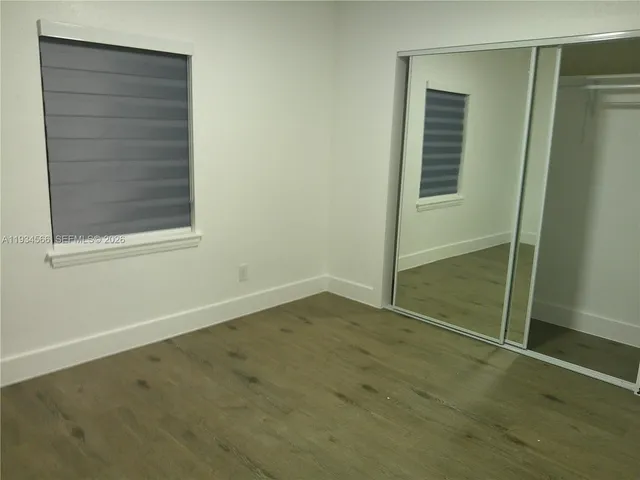 an empty room with window