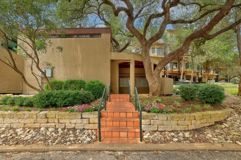 a house view with outdoor seating space