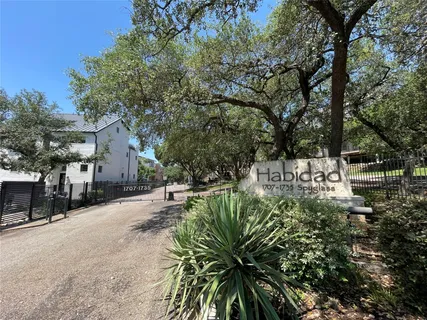a view of outdoor space with swimming pool and furniture