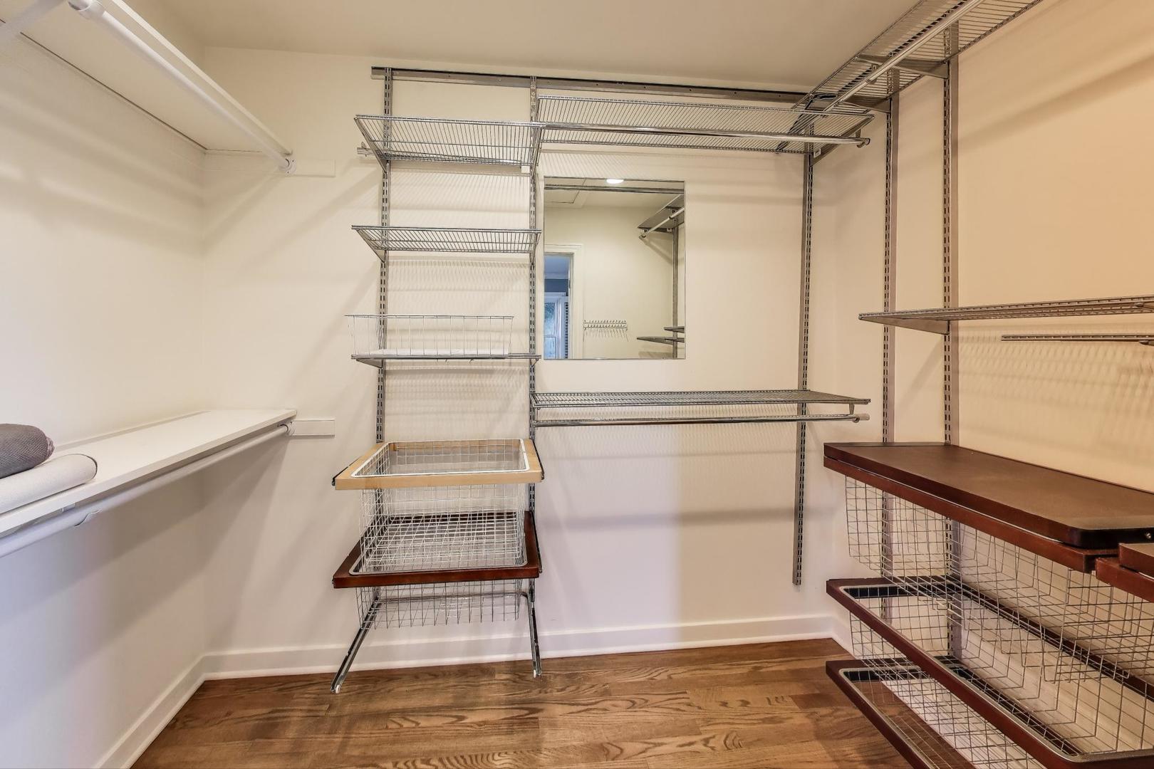 455 Sunset Ridge Road Northfield, IL 60093 - Photo 26 of 47 a view of walk in closet with empty racks