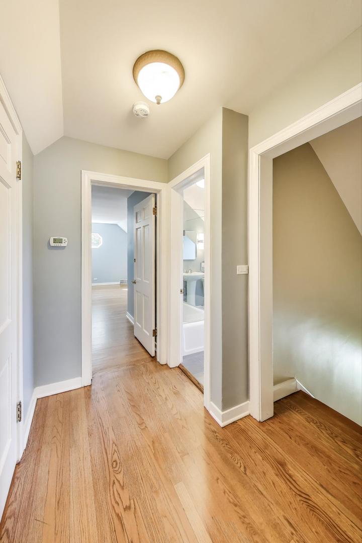 455 Sunset Ridge Road Northfield, IL 60093 - Photo 32 of 47 a view of empty room with wooden floor