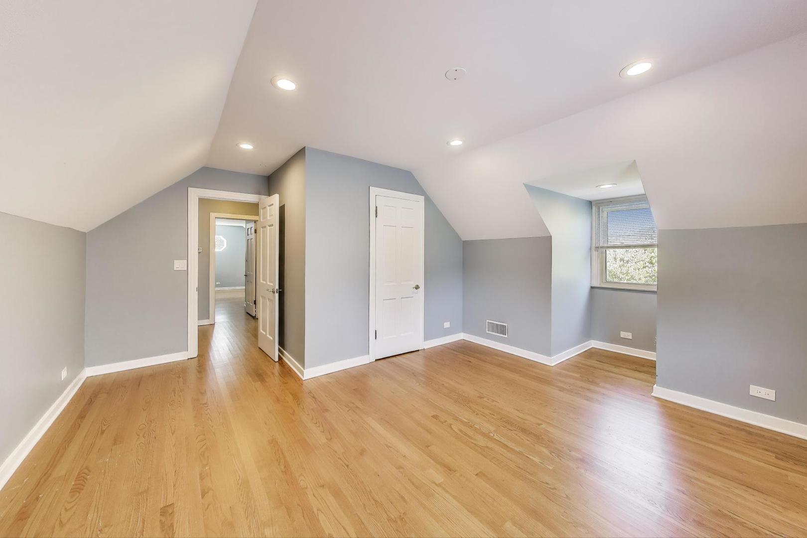 455 Sunset Ridge Road Northfield, IL 60093 - Photo 34 of 47 a view of empty room with wooden floor
