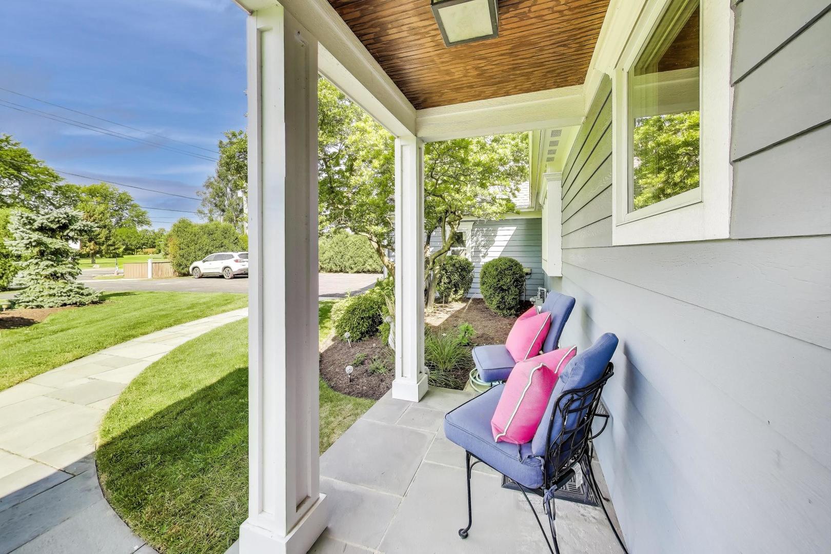 455 Sunset Ridge Road Northfield, IL 60093 - Photo 4 of 47 a view of a two chairs in the deck