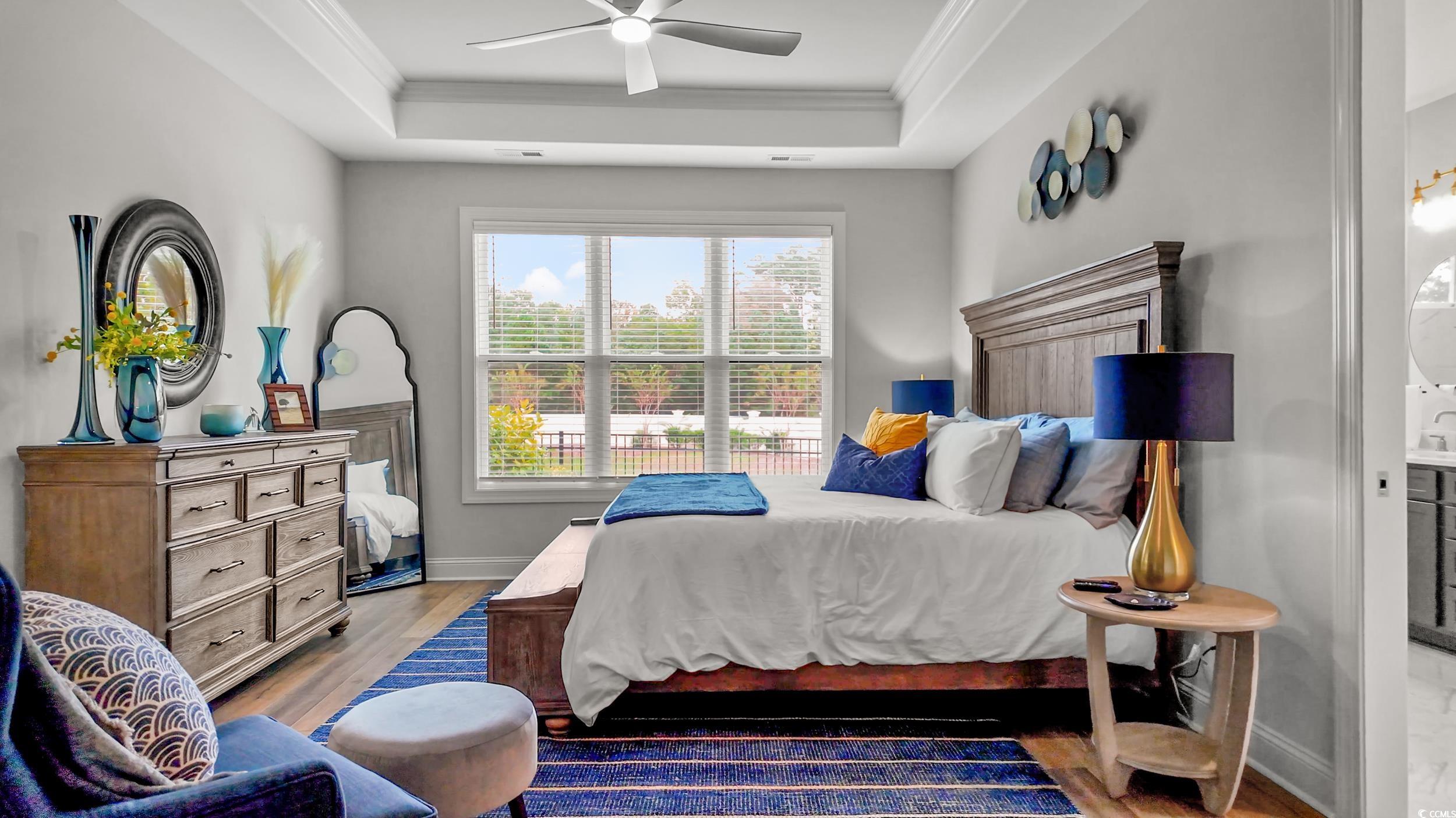 8338 Cape Dutch Loop Myrtle Beach, SC 29572 - Photo 17 of 39 Bedroom featuring crown molding, wood finished floors, and ceiling fan