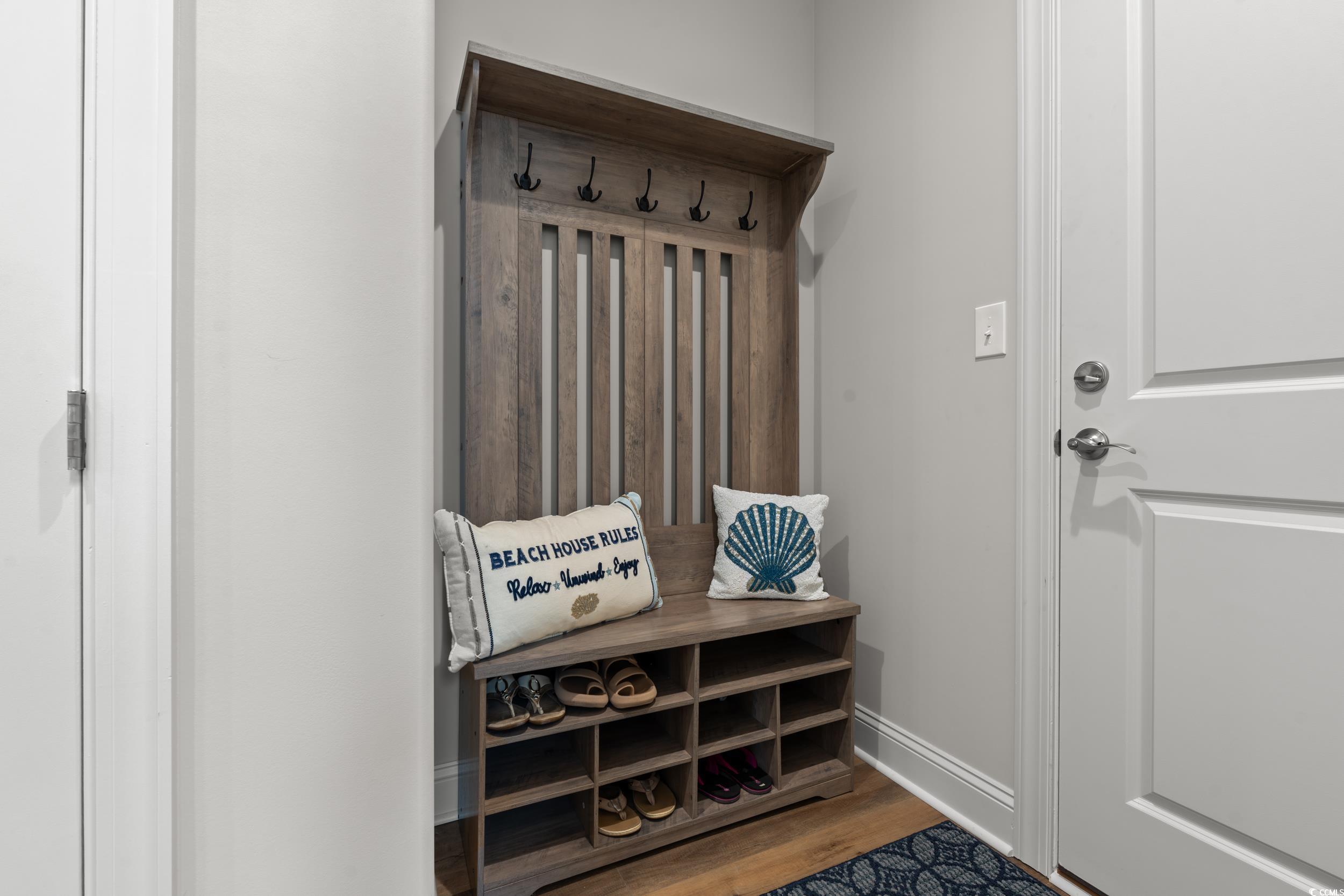 8338 Cape Dutch Loop Myrtle Beach, SC 29572 - Photo 23 of 39 Mudroom featuring light wood-style floors and baseboards