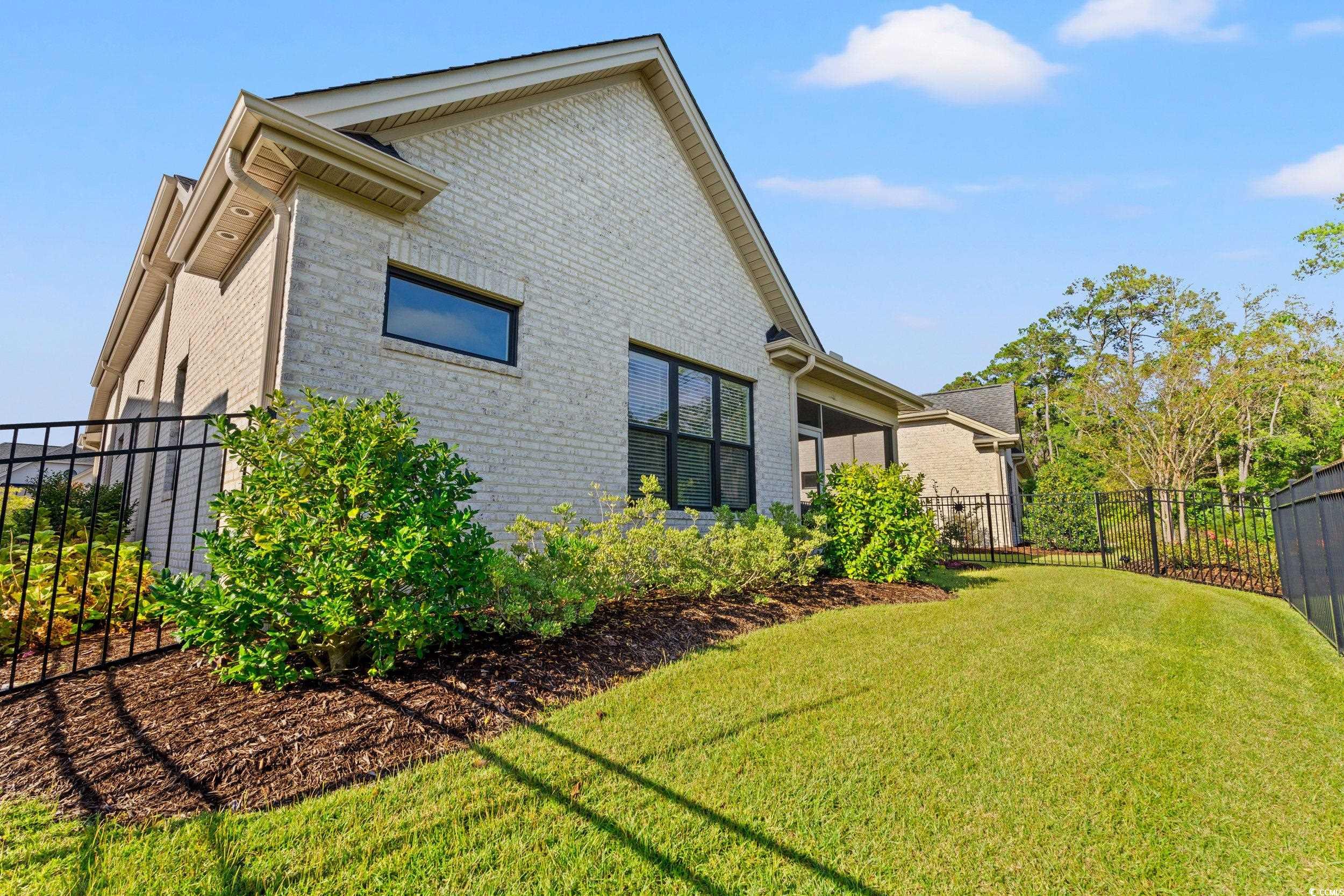 8338 Cape Dutch Loop Myrtle Beach, SC 29572 - Photo 28 of 39 View of home's exterior with brick siding