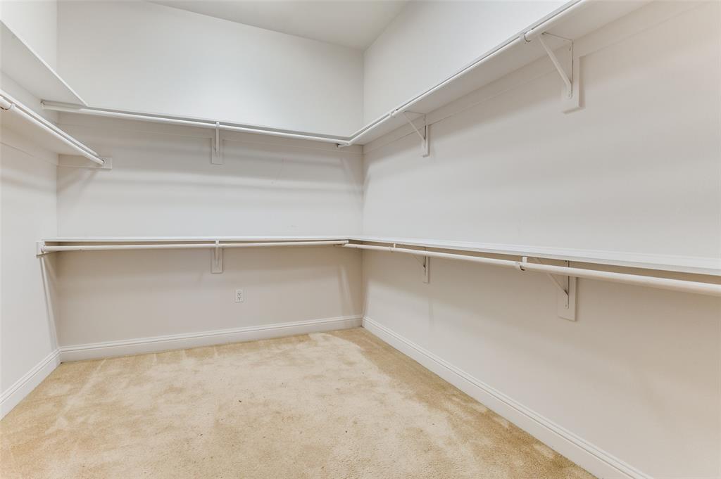 1120 Hemingway Lane Irving, TX 75063 - Photo 18 of 24 a view of an empty walk in closet