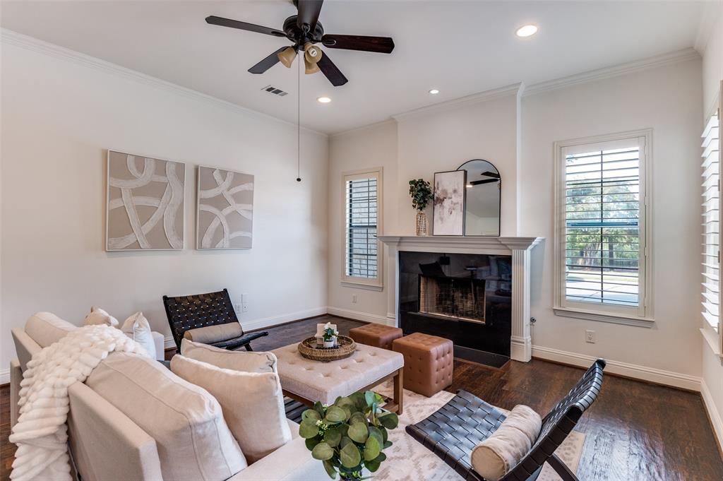 1120 Hemingway Lane Irving, TX 75063 - Photo 2 of 24 a living room with furniture and a fireplace
