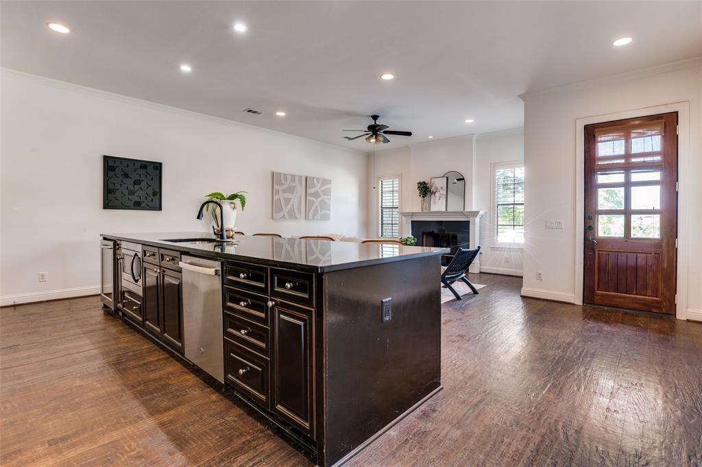 1120 Hemingway Lane Irving, TX 75063 - Photo 4 of 24 a kitchen with stainless steel appliances granite countertop a stove and a sink