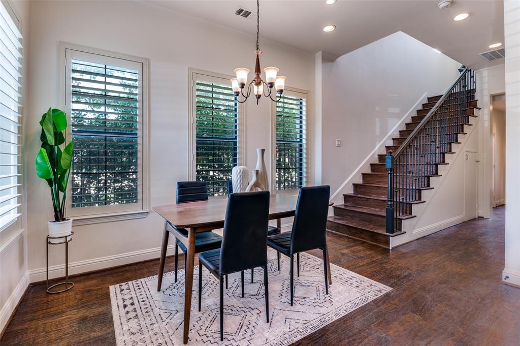 1120 Hemingway Lane Irving, TX 75063 - Photo 9 of 24 a view of a dining room with furniture window and wooden floor