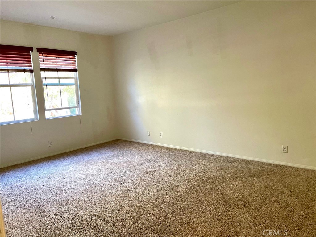 312 Quail Ridge Irvine, CA 92603 - Photo 11 of 35 an empty room with a window