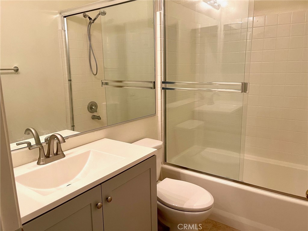 312 Quail Ridge Irvine, CA 92603 - Photo 9 of 35 a bathroom with a sink toilet and shower